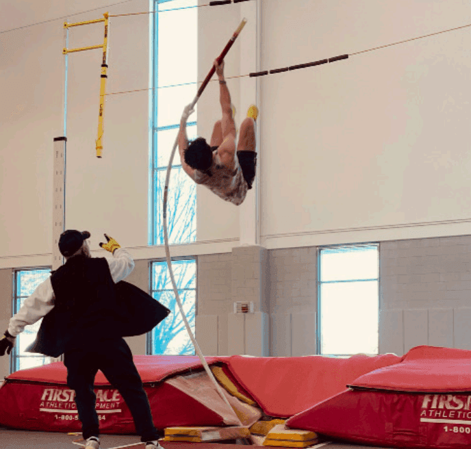 On a chilly Wednesday afternoon on Feb. 4 in the William Boyce Thompson Field House, senior Dana Mussulman etched his name into Phillips Exeter Academy’s athletic hall of fame. Clearing 14-01.00 in pole vault, Dana Mussulman surpassed Cameron Hawley ‘79’s longstanding mark of 14-00.50, setting a new Exeter program record.