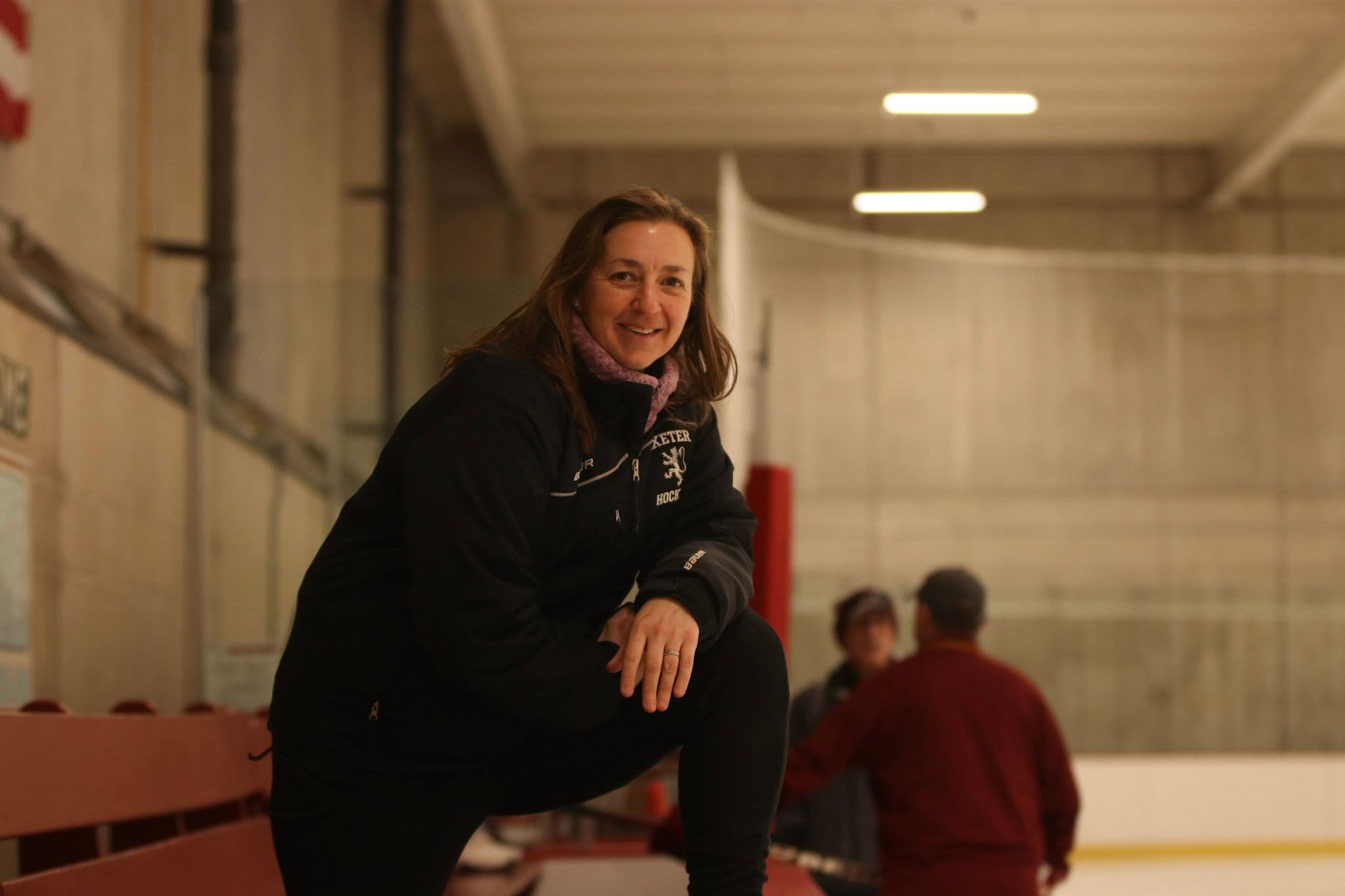 Skates scrape across the ice. Pucks slam against the boards. Shouts echo off the walls. In the middle of it all is coach Melissa Pacific, whistle blowing and arms waving as she orchestrates practice for the girls’ JV hockey team.